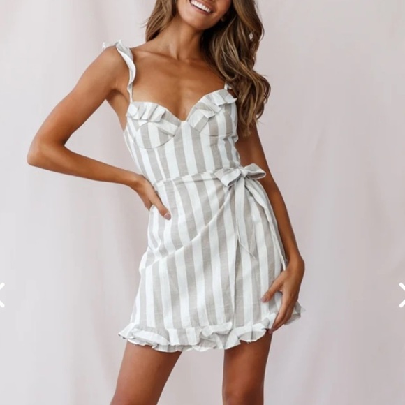 Saints + Secrets cotton wrap dress in beige white stripe with ruffle details. SM - Picture 1 of 11